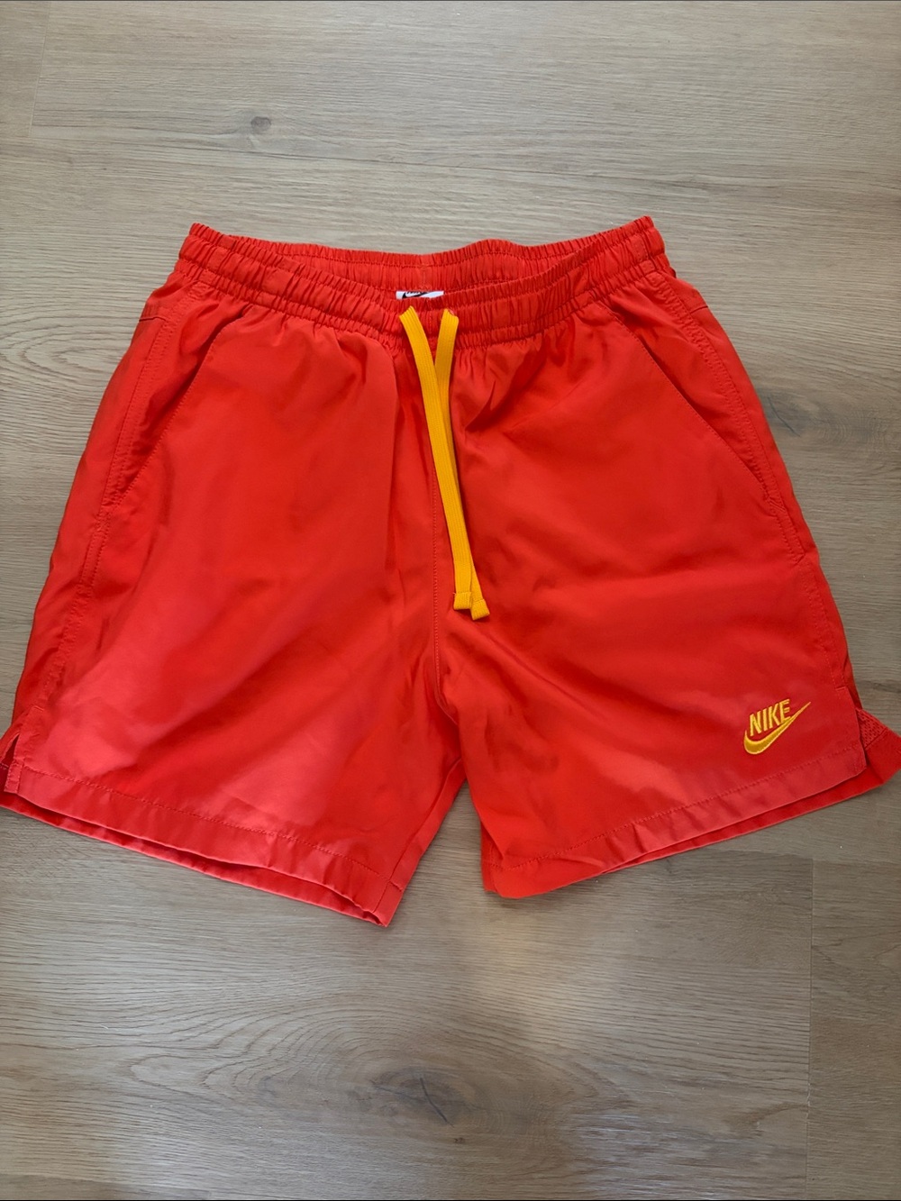 Nike Men’s Red Athletic Shorts with Yellow Drawcord